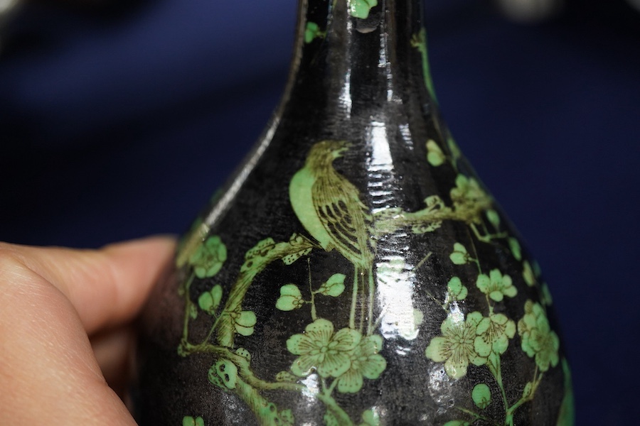 A Chinese famille noire bottle vase, 17cm high